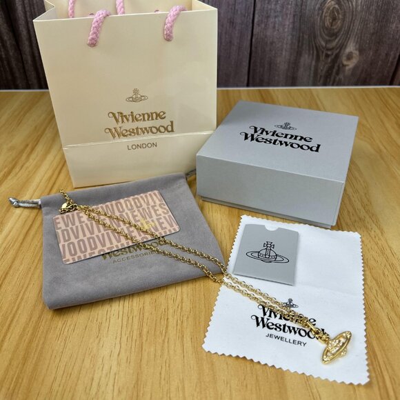 Vivienne Westwood Jewelry - NEW Vivienne Westwood Mini bas relief pendant Gold